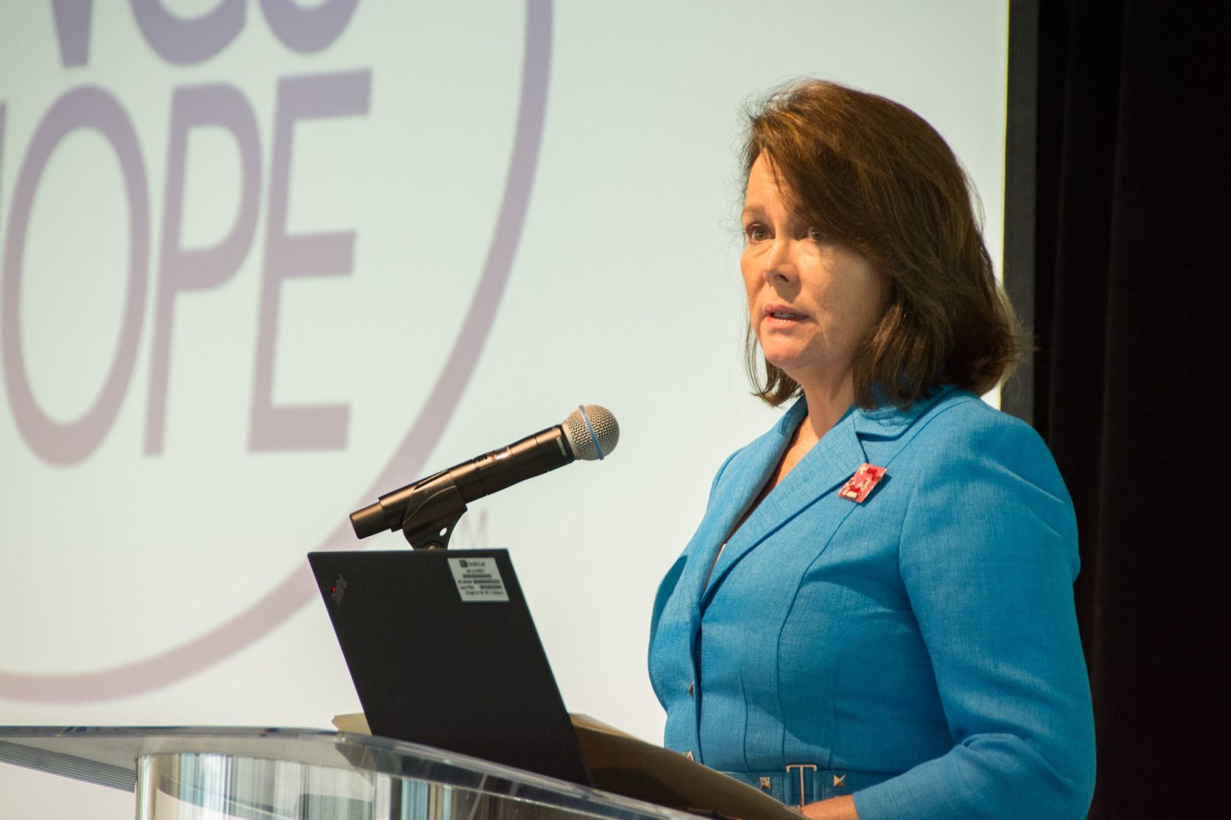 Laura Helling, Vice-President of Wings of Hope speaks to the guests in attendance